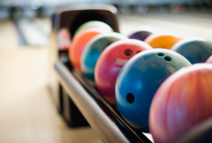  A row of colorful bowling balls. 