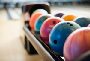 A row of colorful bowling balls.
