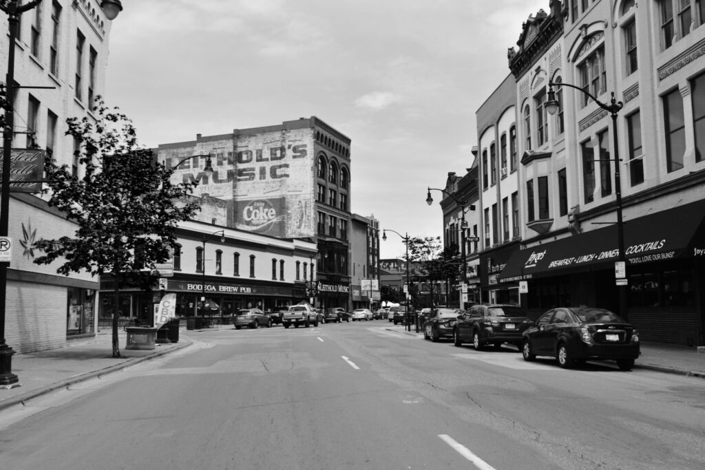 Black and white photo of downtown La Crosse signifies the ghost stories and haunted locations around the area.