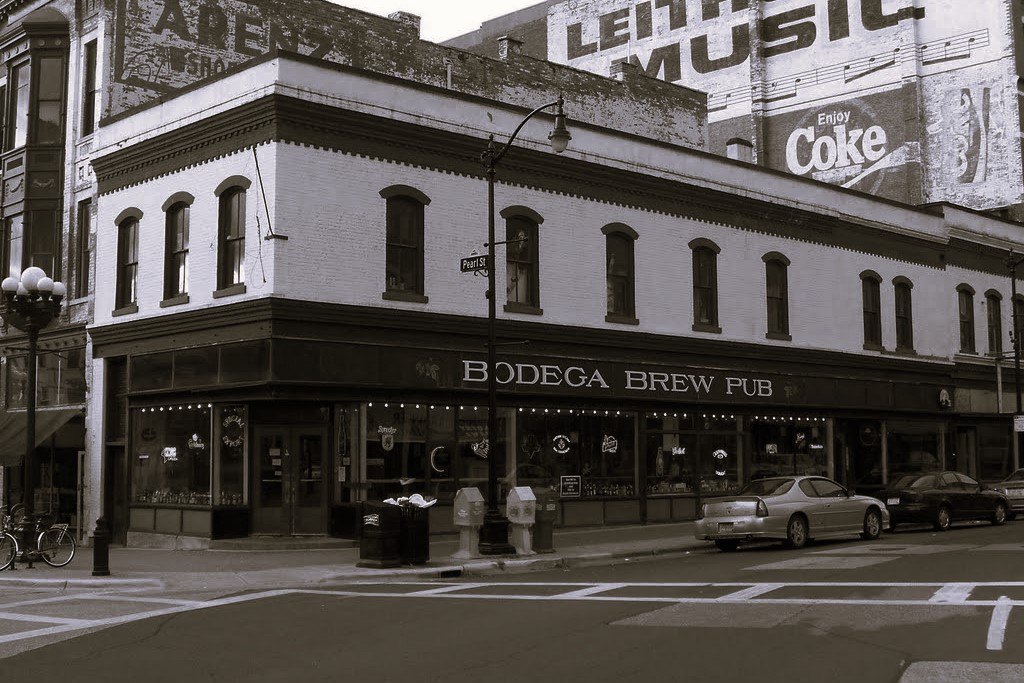 Black and white photo of downtown La Crosse at Bodega Brew Pub signifies the ghost stories and haunted locations around the area.