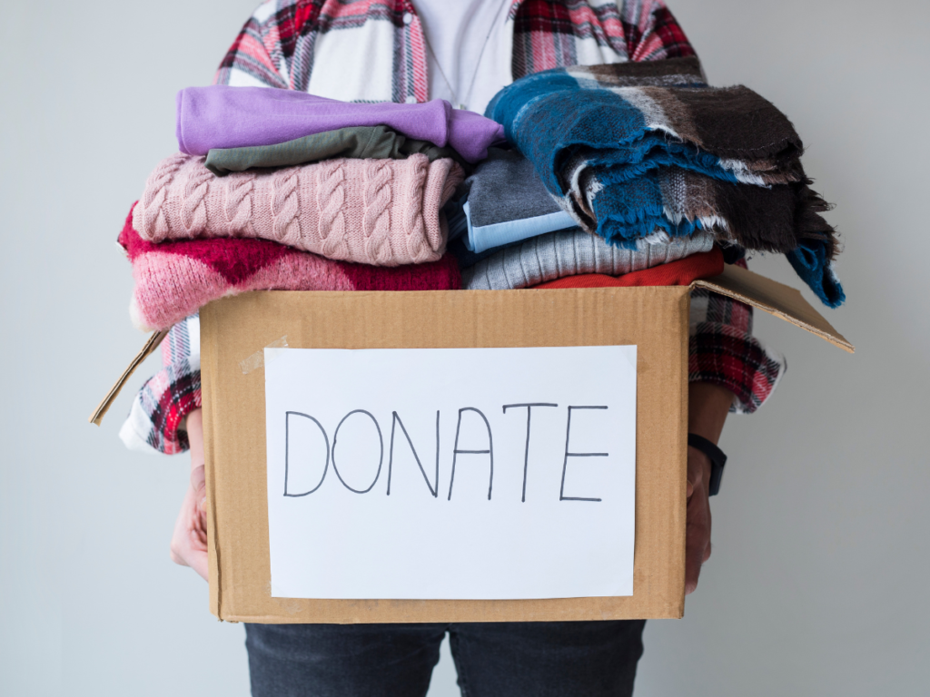 A donate bin is full of clothes giving way to donating and volunteer opportunities in the La Crosse area.