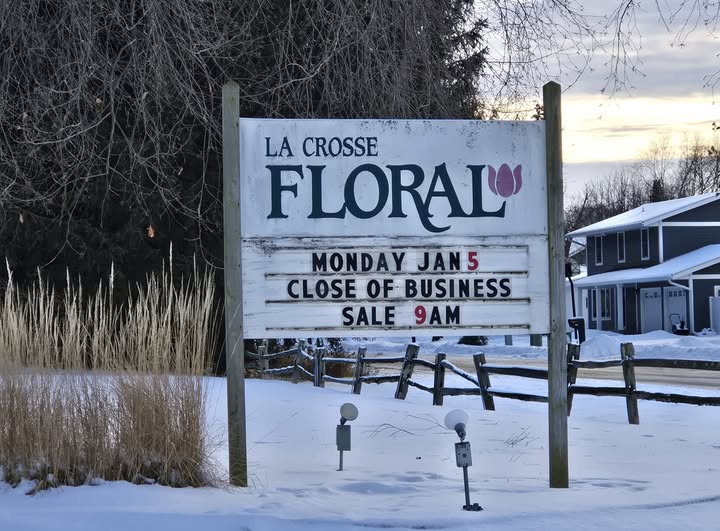la crosse floral outdoor sign promoting the closing sale on January 5