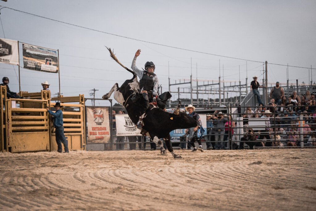 Image of a bull rider at Winneshiek Firemen's Bull Bash 2026.